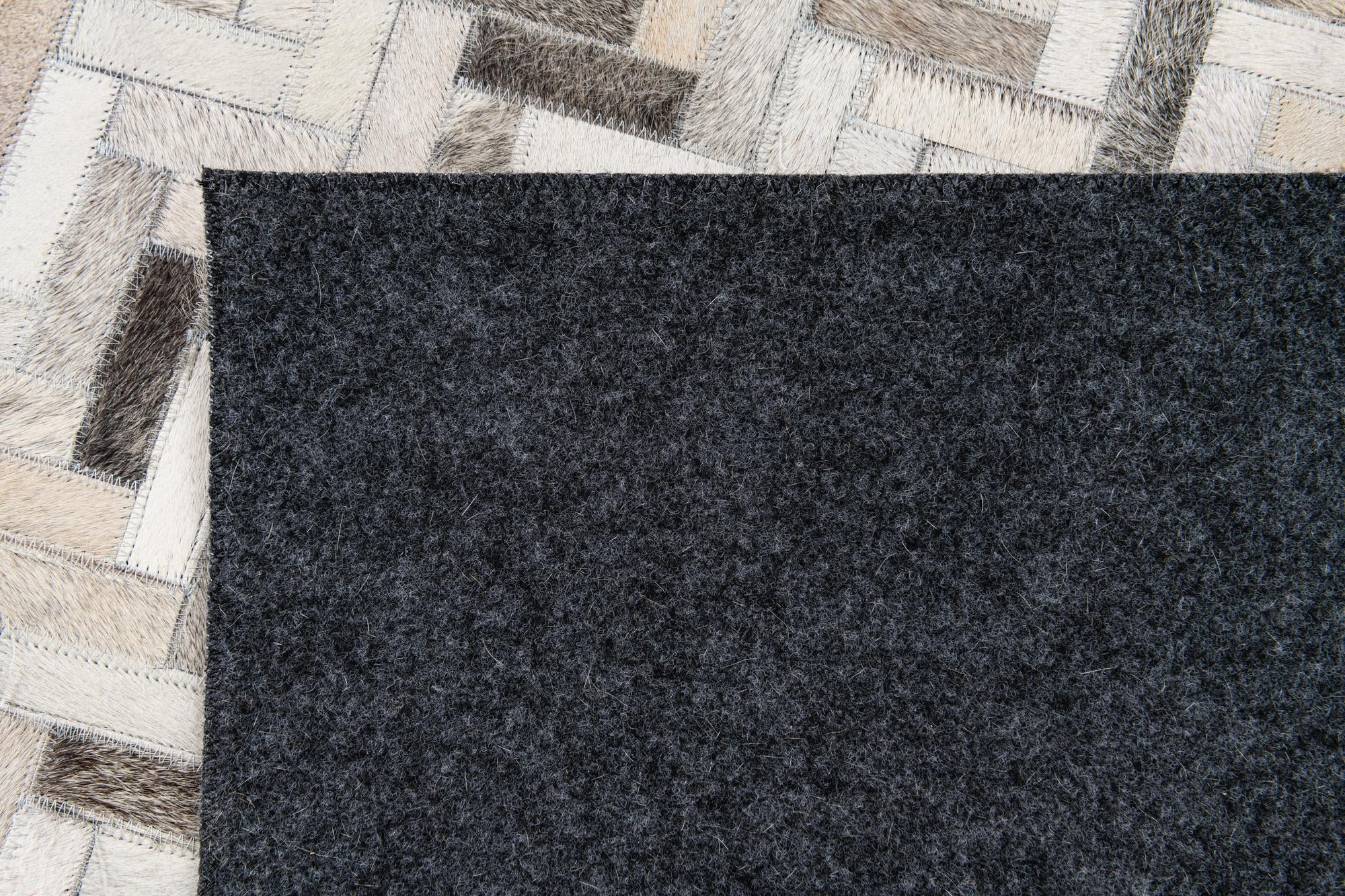 5' x 7' 11 Cowhide Stocks Rug