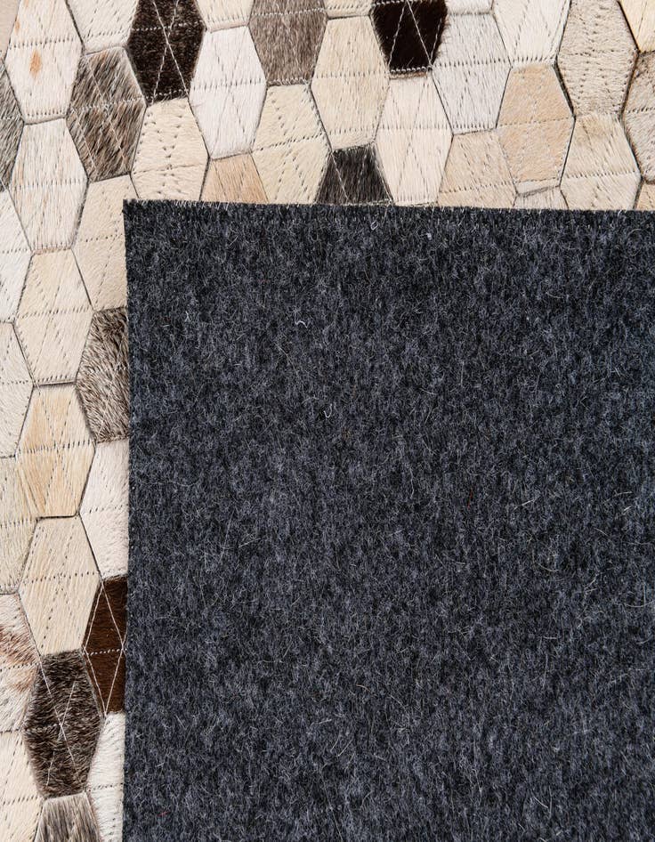 Detail image of 5' 4 x 7' 7 Cowhide Stocks Rug