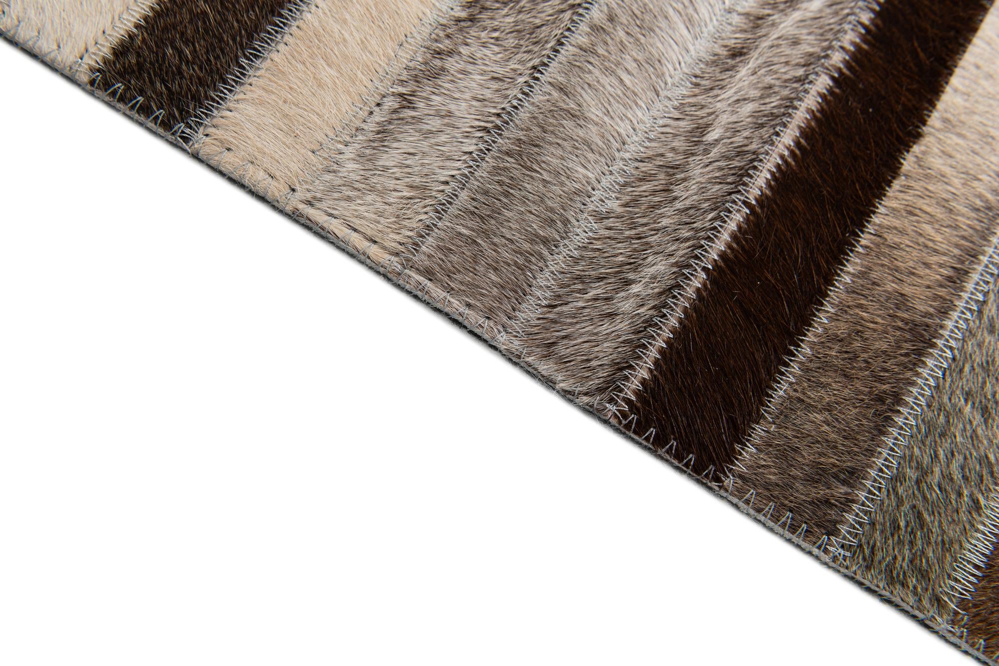 5' 1 x 8' Cowhide Stocks Rug