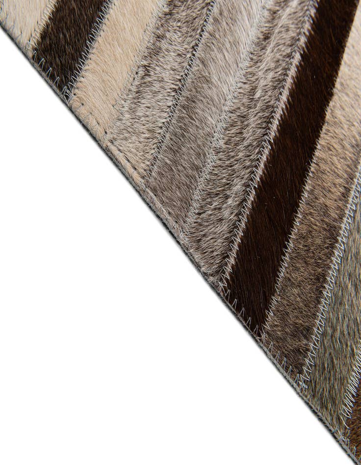 Detail image of 5' 1 x 8' Cowhide Stocks Rug