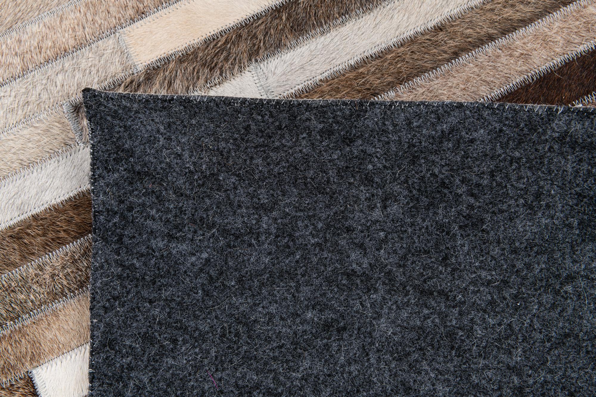 5' 1 x 8' Cowhide Stocks Rug
