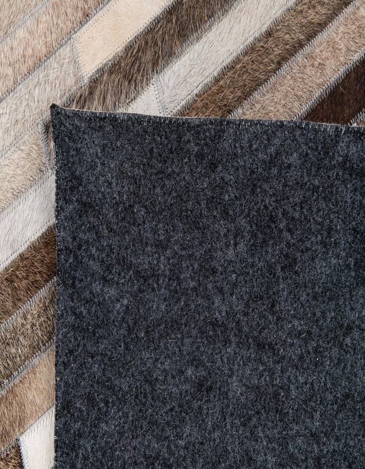 Detail image of 5' 1 x 8' Cowhide Stocks Rug