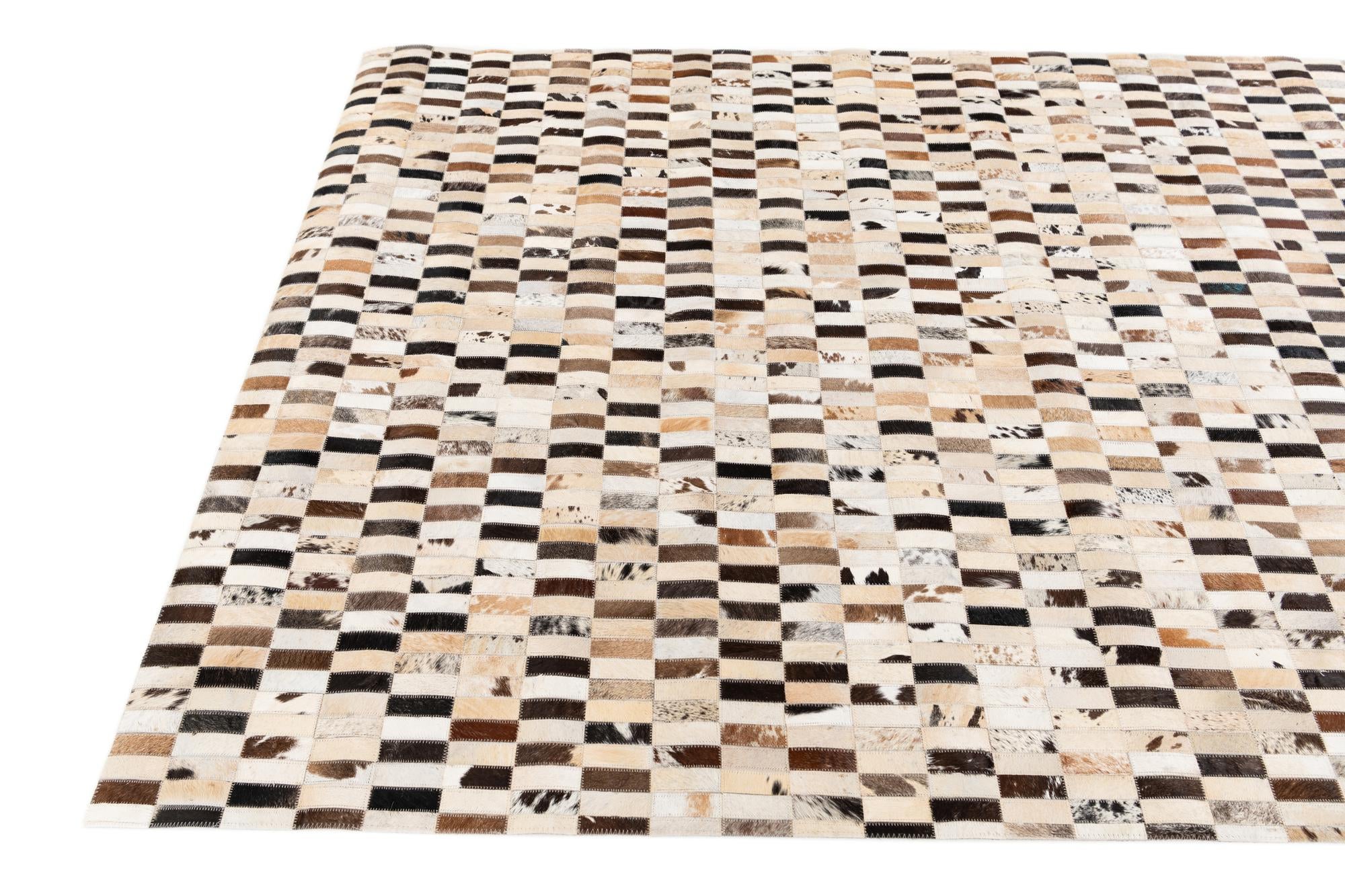 5' x 7' 9 Cowhide Stocks Rug