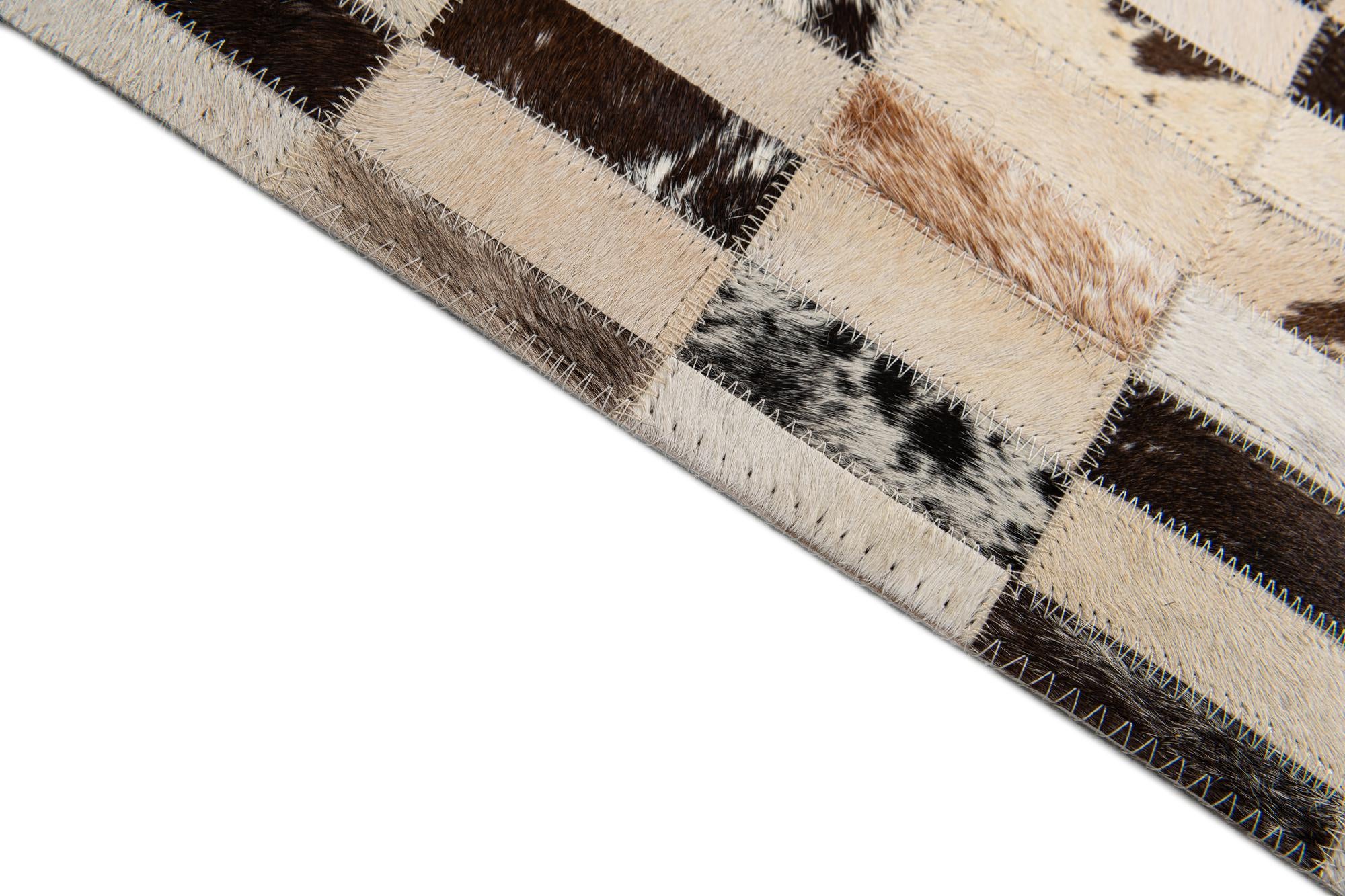 5' x 7' 9 Cowhide Stocks Rug