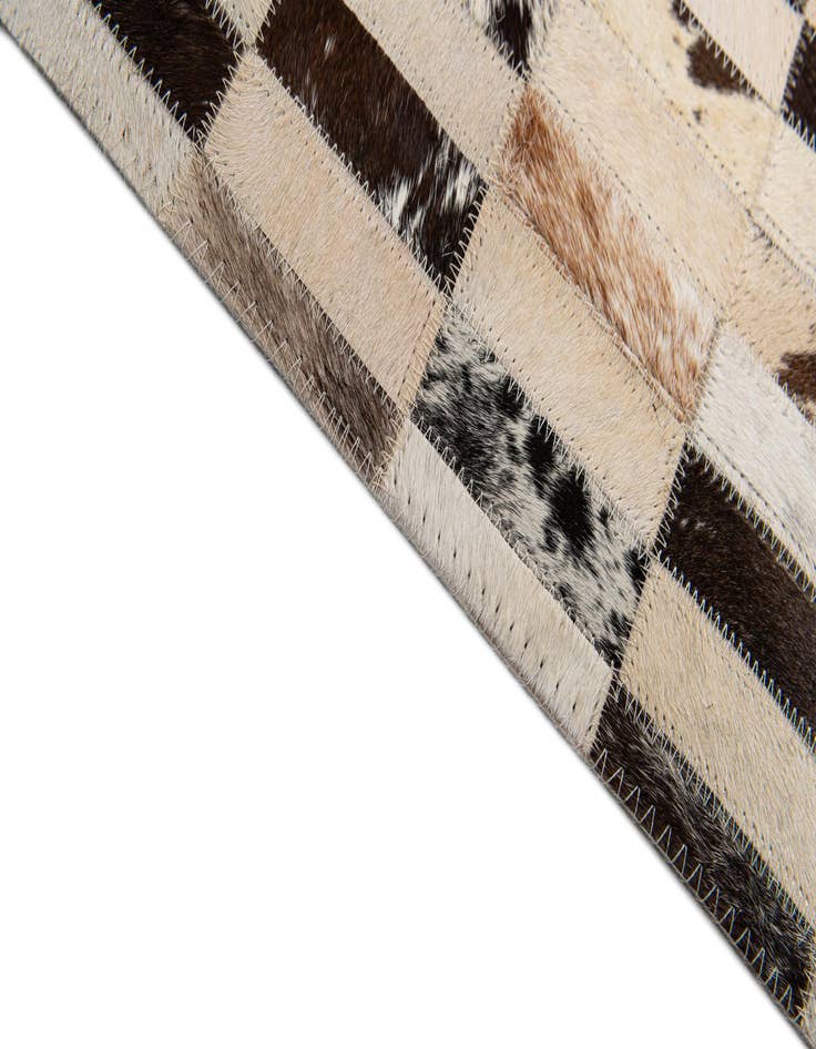 Detail image of 5' x 7' 9 Cowhide Stocks Rug