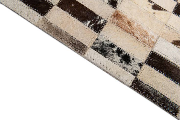 Detail image of 5' x 7' 9 Cowhide Stocks Rug