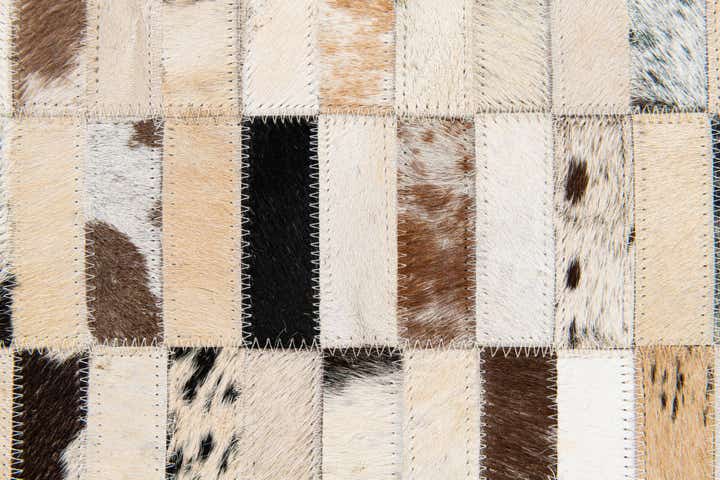 5' x 7' 9 Cowhide Stocks Rug