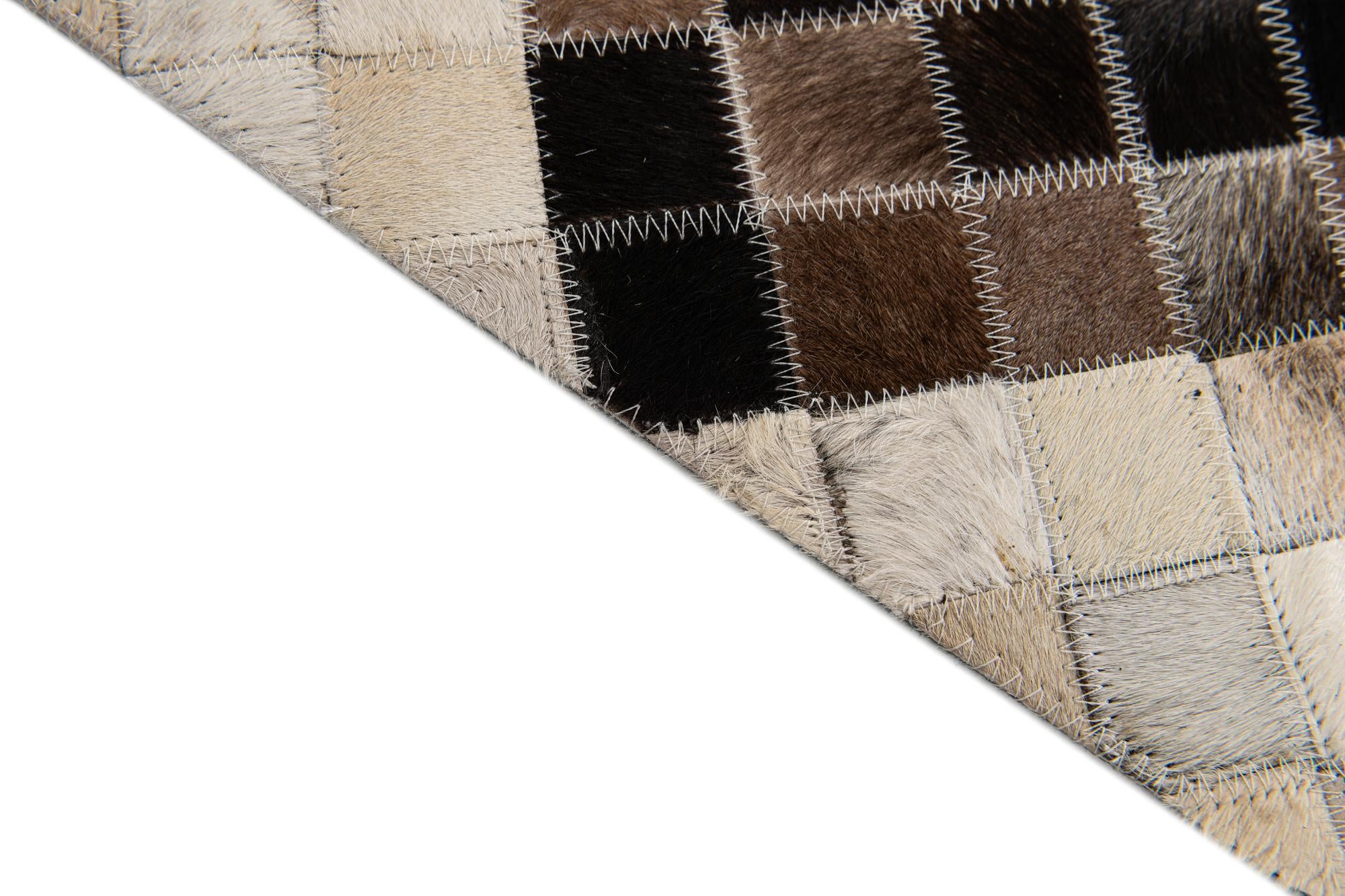 5' x 7' 11 Cowhide Stocks Rug
