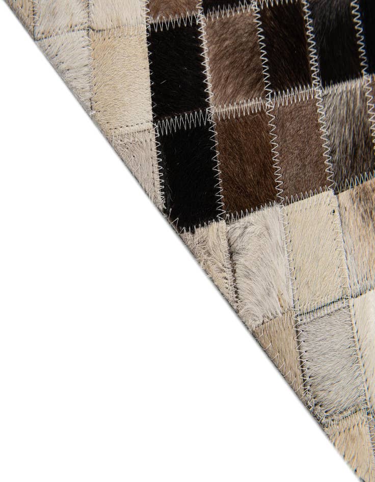 Detail image of 5' x 7' 11 Cowhide Stocks Rug