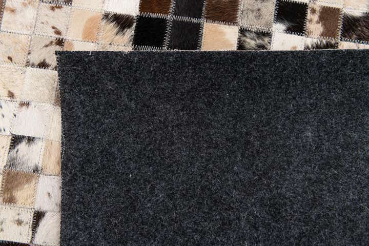 5' x 7' 11 Cowhide Stocks Rug