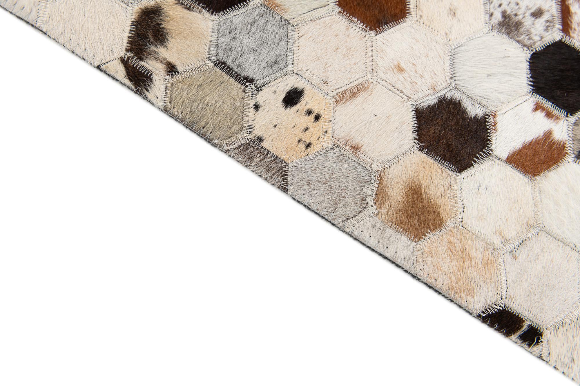 5' 11 x 8' Cowhide Stocks Rug