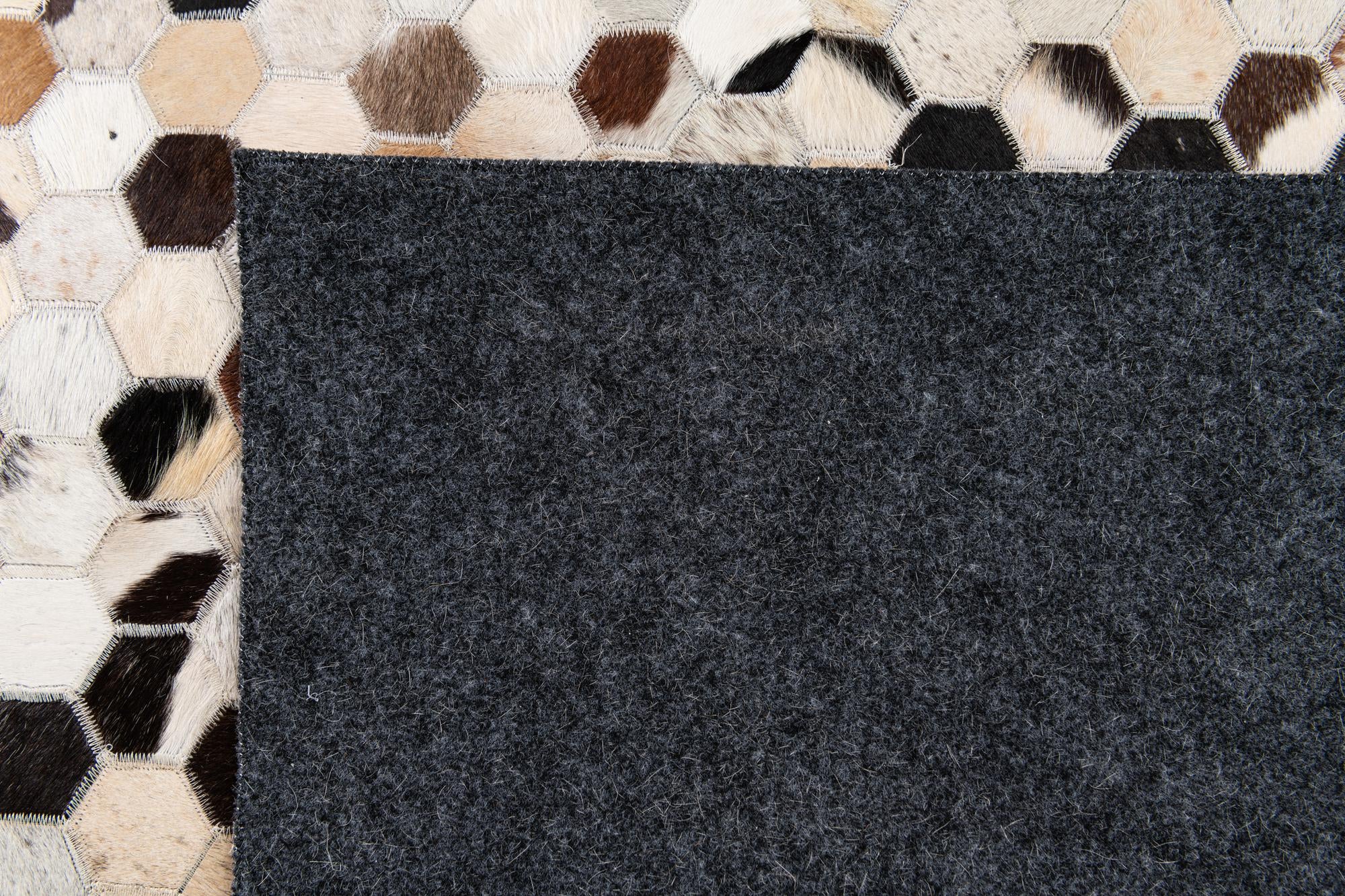 5' 11 x 8' Cowhide Stocks Rug