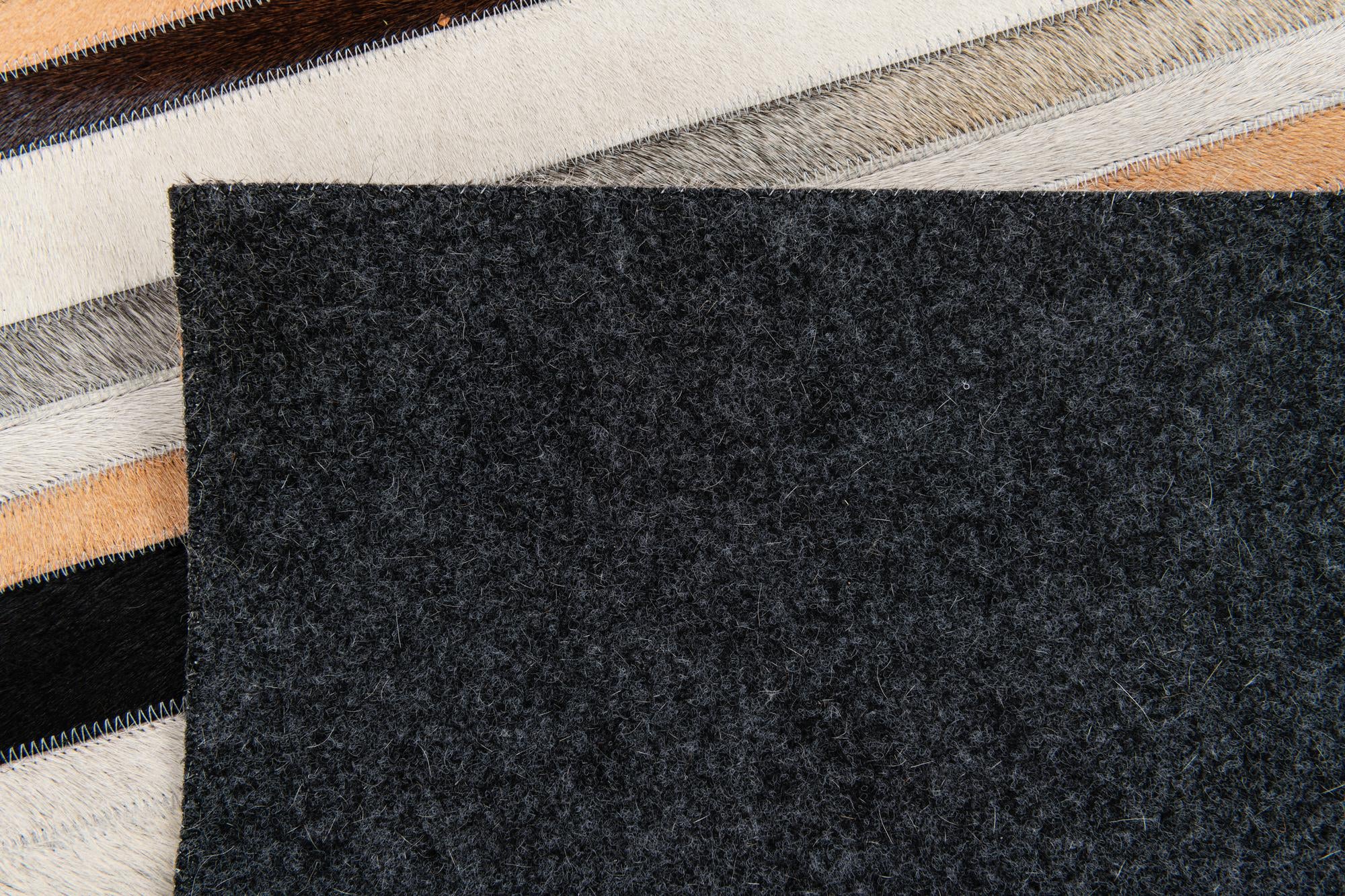 5' 1 x 7' 11 Cowhide Stocks Rug