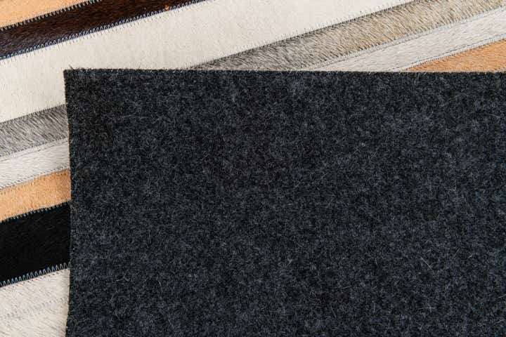 5' 1 x 7' 11 Cowhide Stocks Rug