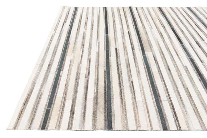 5' 1 x 7' 10 Cowhide Stocks Rug
