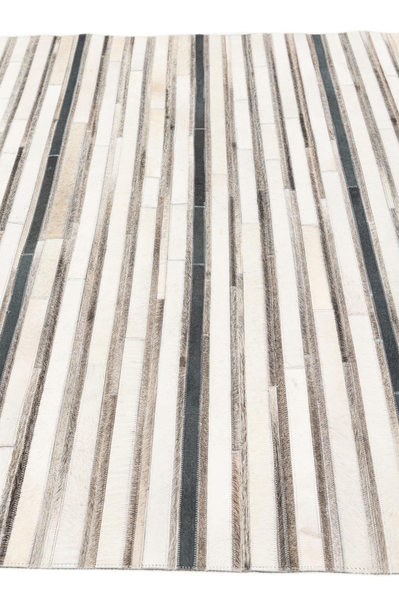 5' 1 x 7' 10 Cowhide Stocks Rug