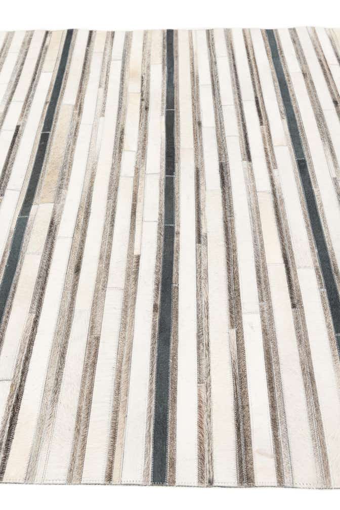 5' 1 x 7' 10 Cowhide Stocks Rug