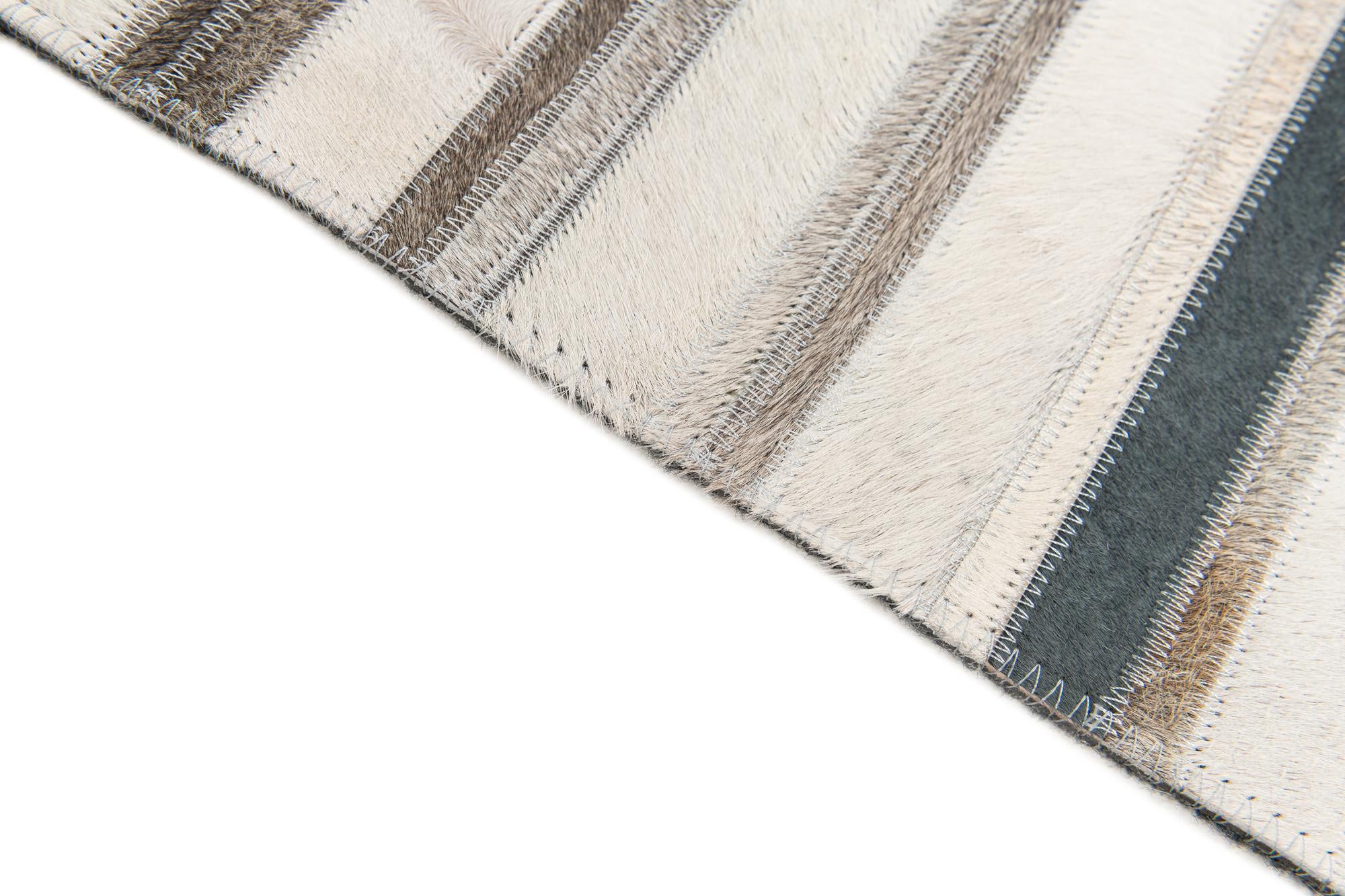 5' 1 x 7' 10 Cowhide Stocks Rug
