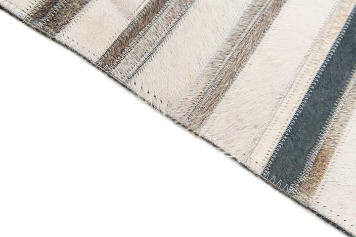 5' 1 x 7' 10 Cowhide Stocks Rug