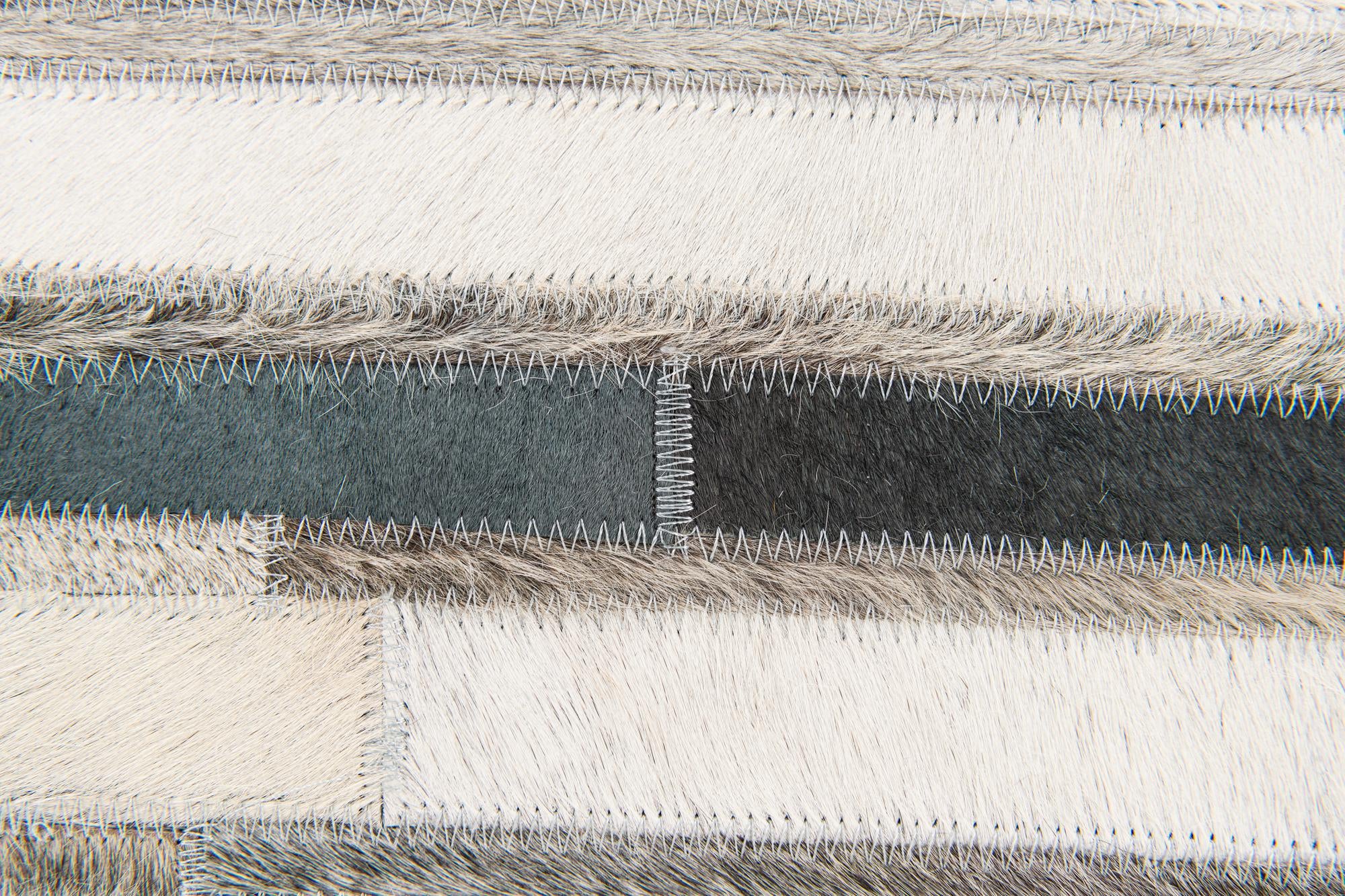 5' 1 x 7' 10 Cowhide Stocks Rug