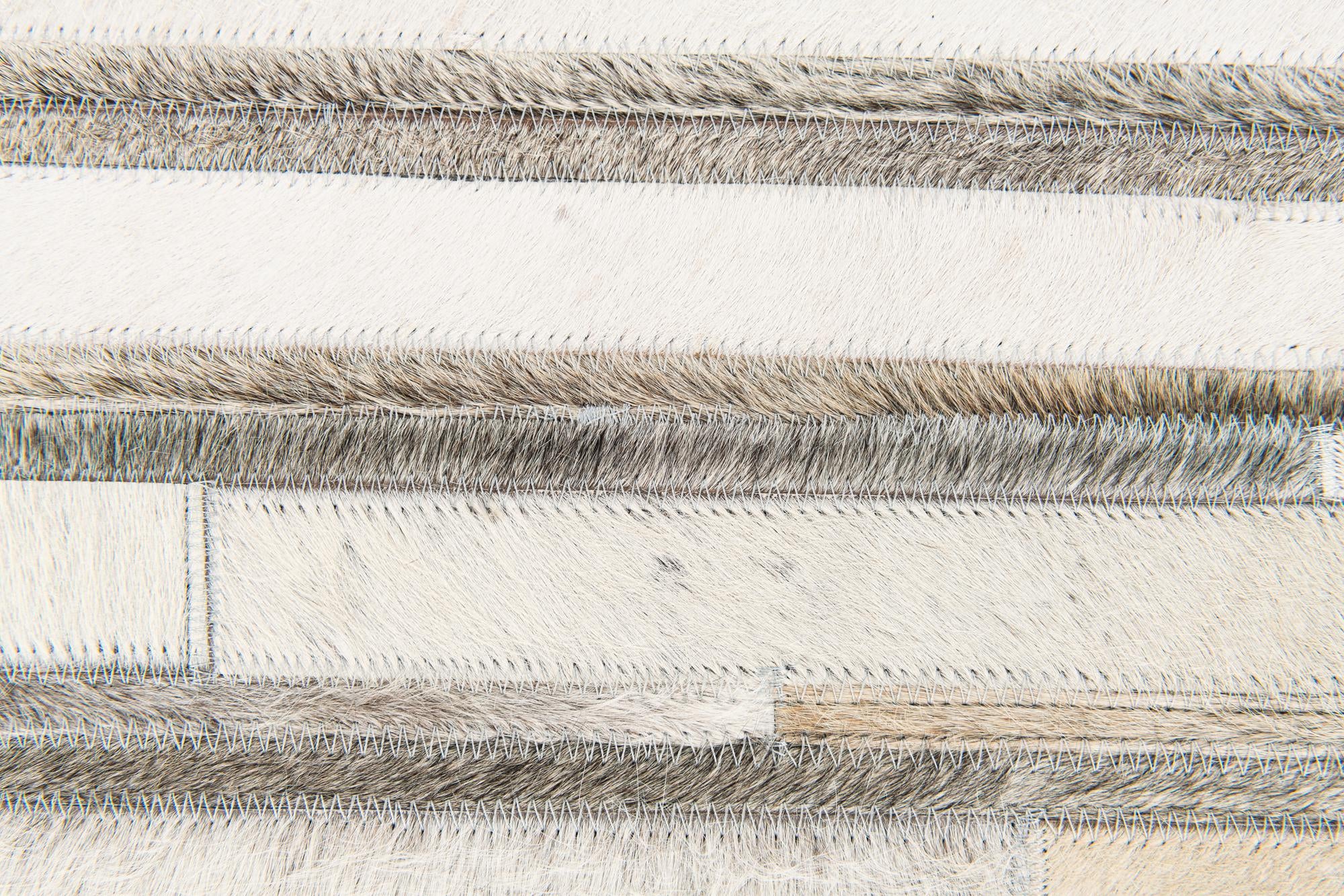 5' 1 x 7' 10 Cowhide Stocks Rug
