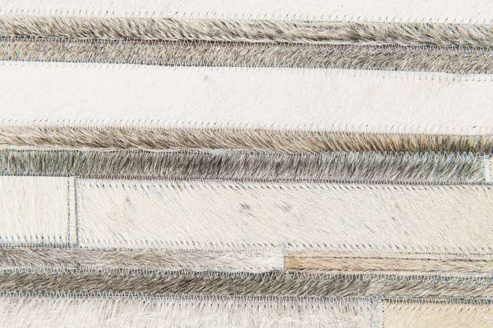 5' 1 x 7' 10 Cowhide Stocks Rug