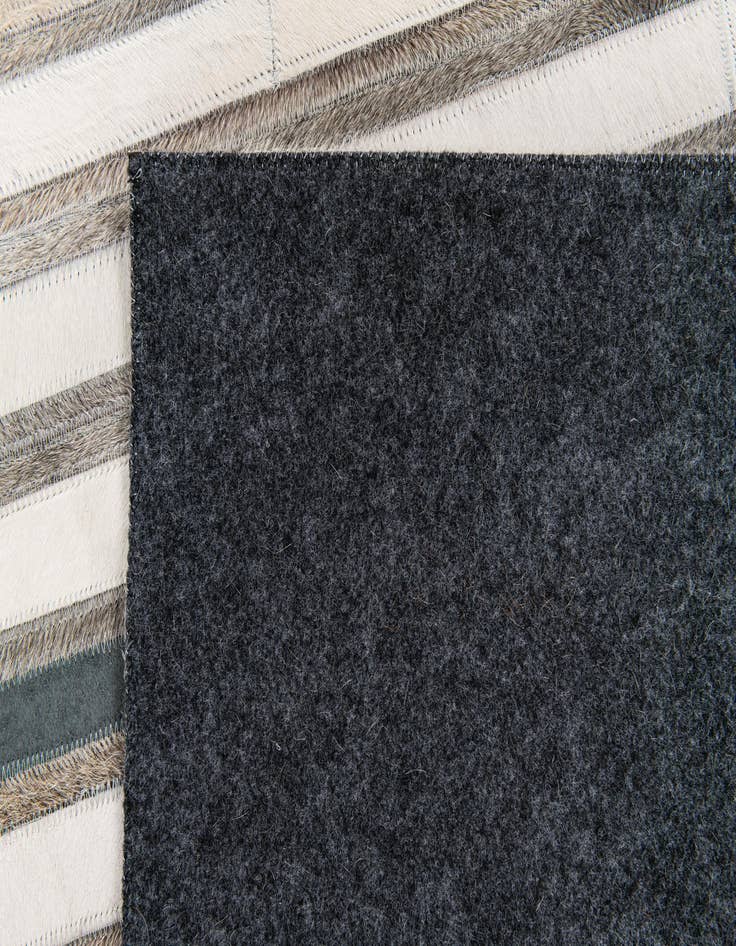 Detail image of 5' 1 x 7' 10 Cowhide Stocks Rug