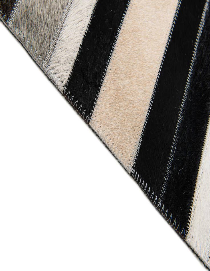 Detail image of 5' 1 x 7' 11 Cowhide Stocks Rug