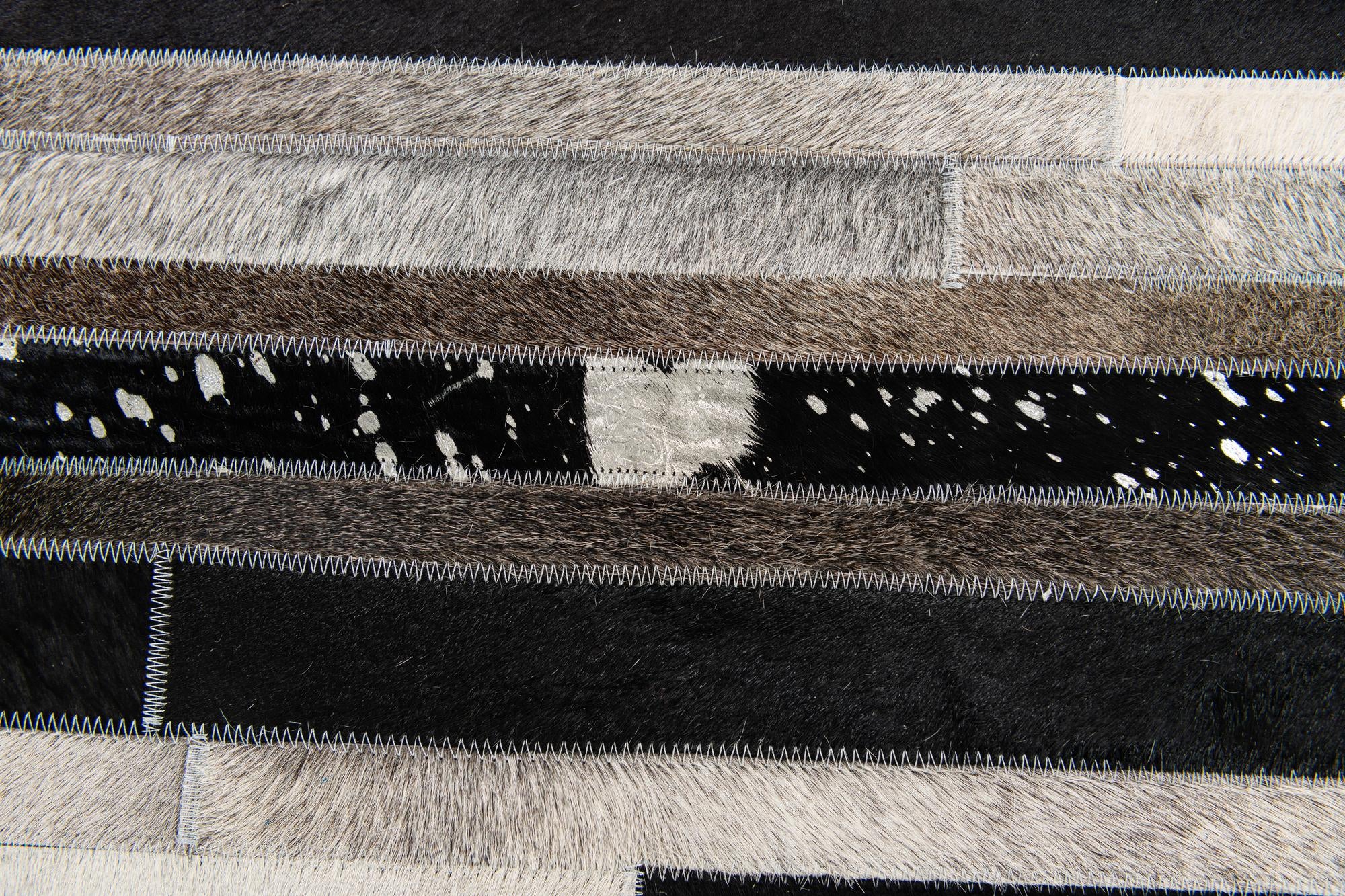 5' 1 x 7' 11 Cowhide Stocks Rug