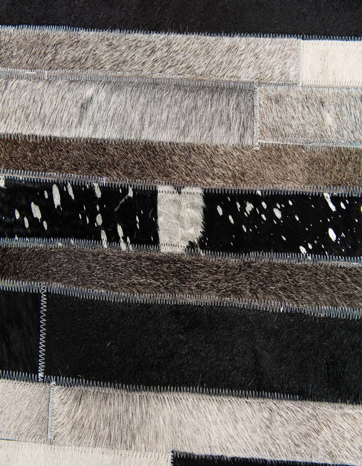 Detail image of 5' 1 x 7' 11 Cowhide Stocks Rug