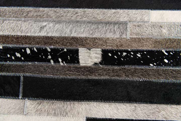 5' 1 x 7' 11 Cowhide Stocks Rug