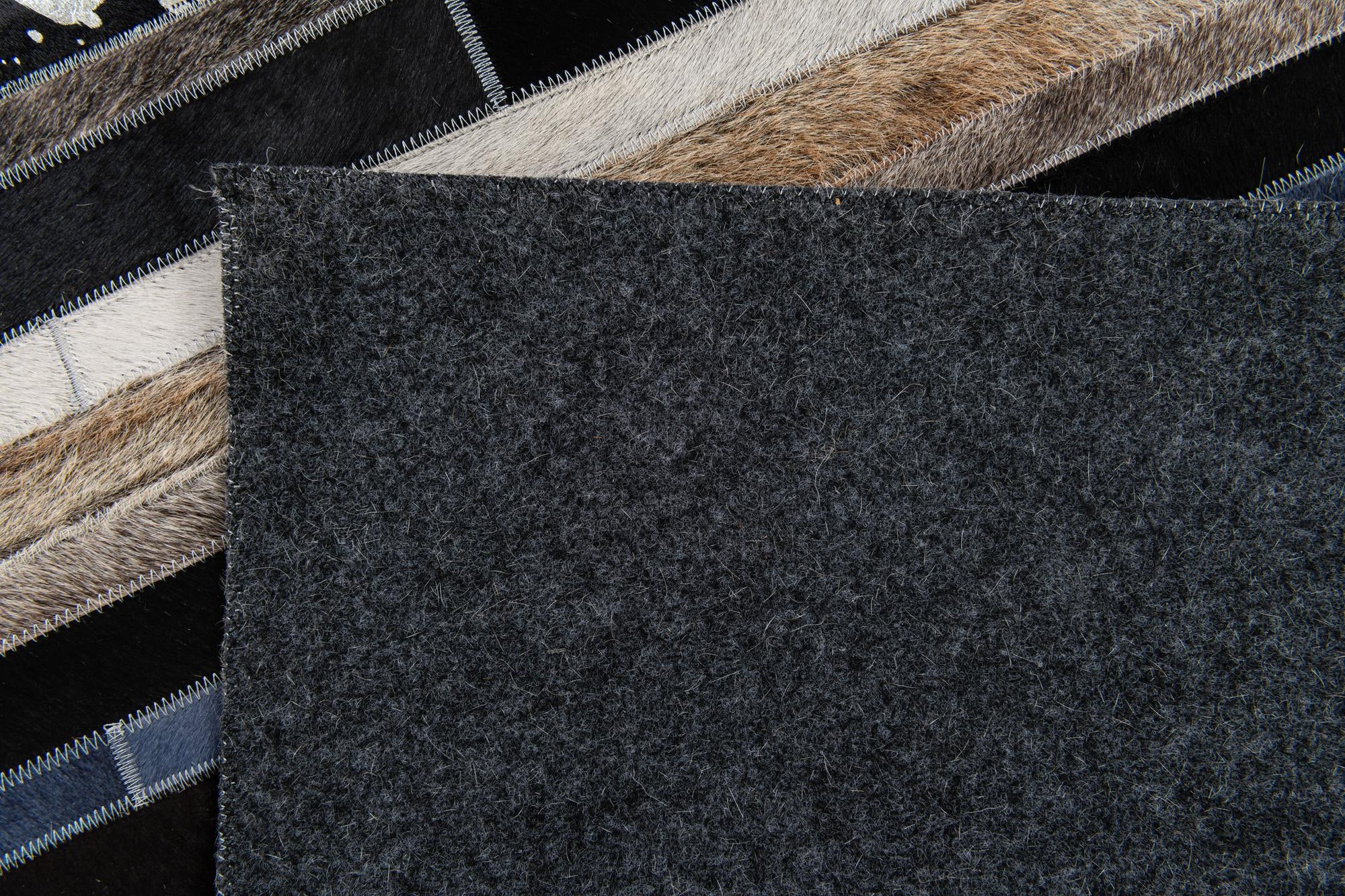 5' 1 x 7' 11 Cowhide Stocks Rug