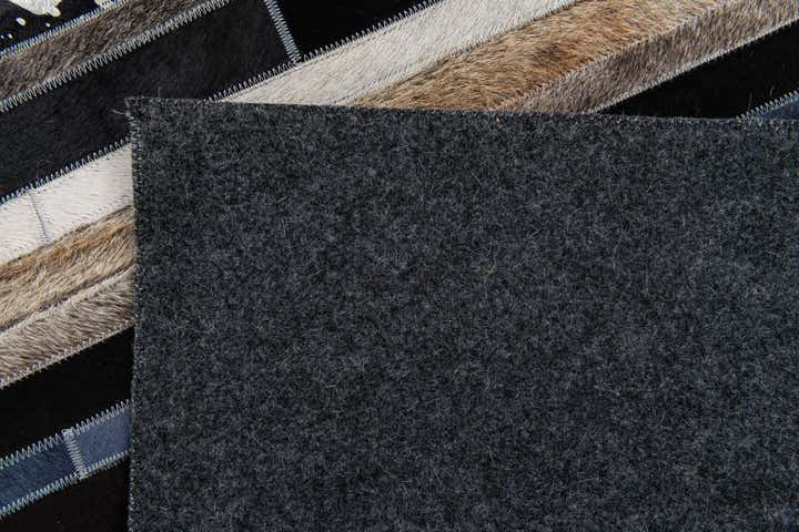 5' 1 x 7' 11 Cowhide Stocks Rug