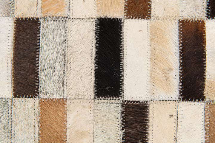 4' 11 x 7' 10 Cowhide Stocks Rug