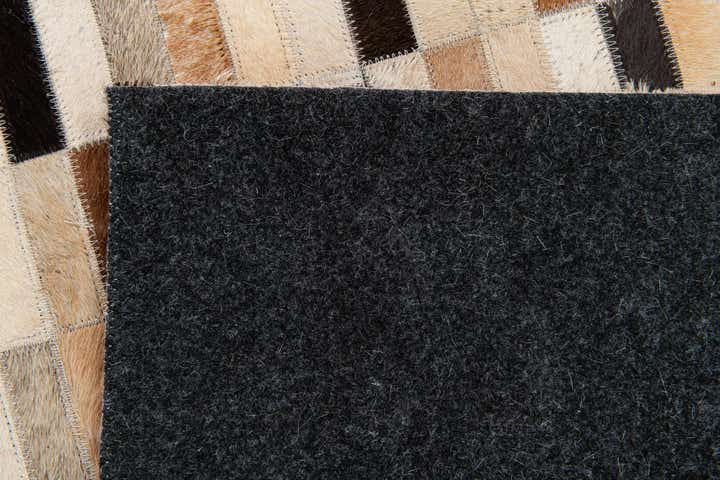 4' 11 x 7' 10 Cowhide Stocks Rug