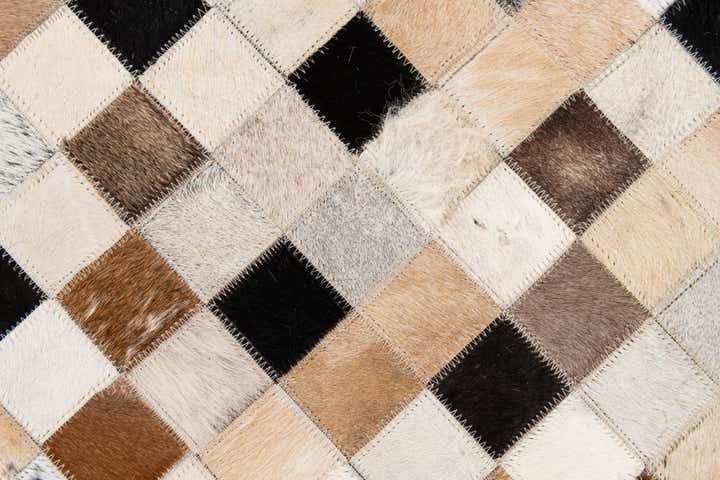 5' 1 x 7' 11 Cowhide Stocks Rug