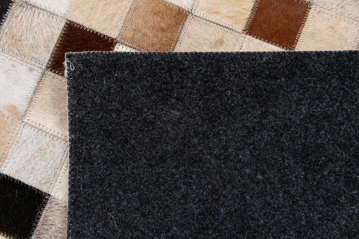 5' 1 x 7' 11 Cowhide Stocks Rug