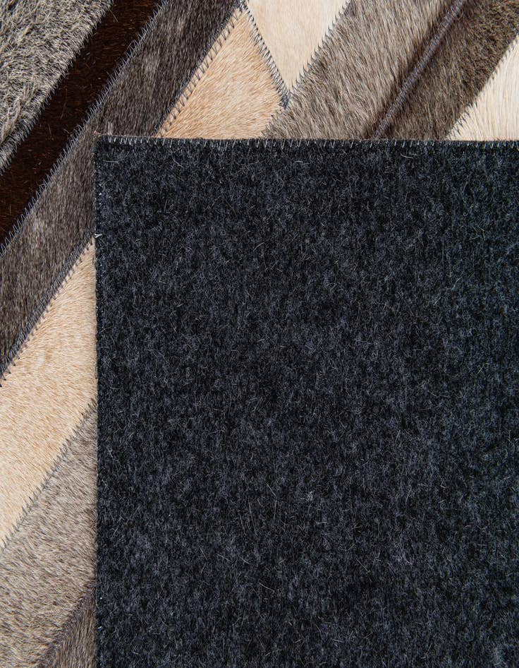 Detail image of 5' 1 x 8' Cowhide Stocks Rug