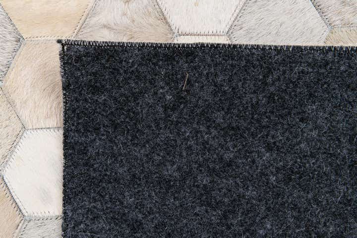5' x 8' Cowhide Stocks Rug