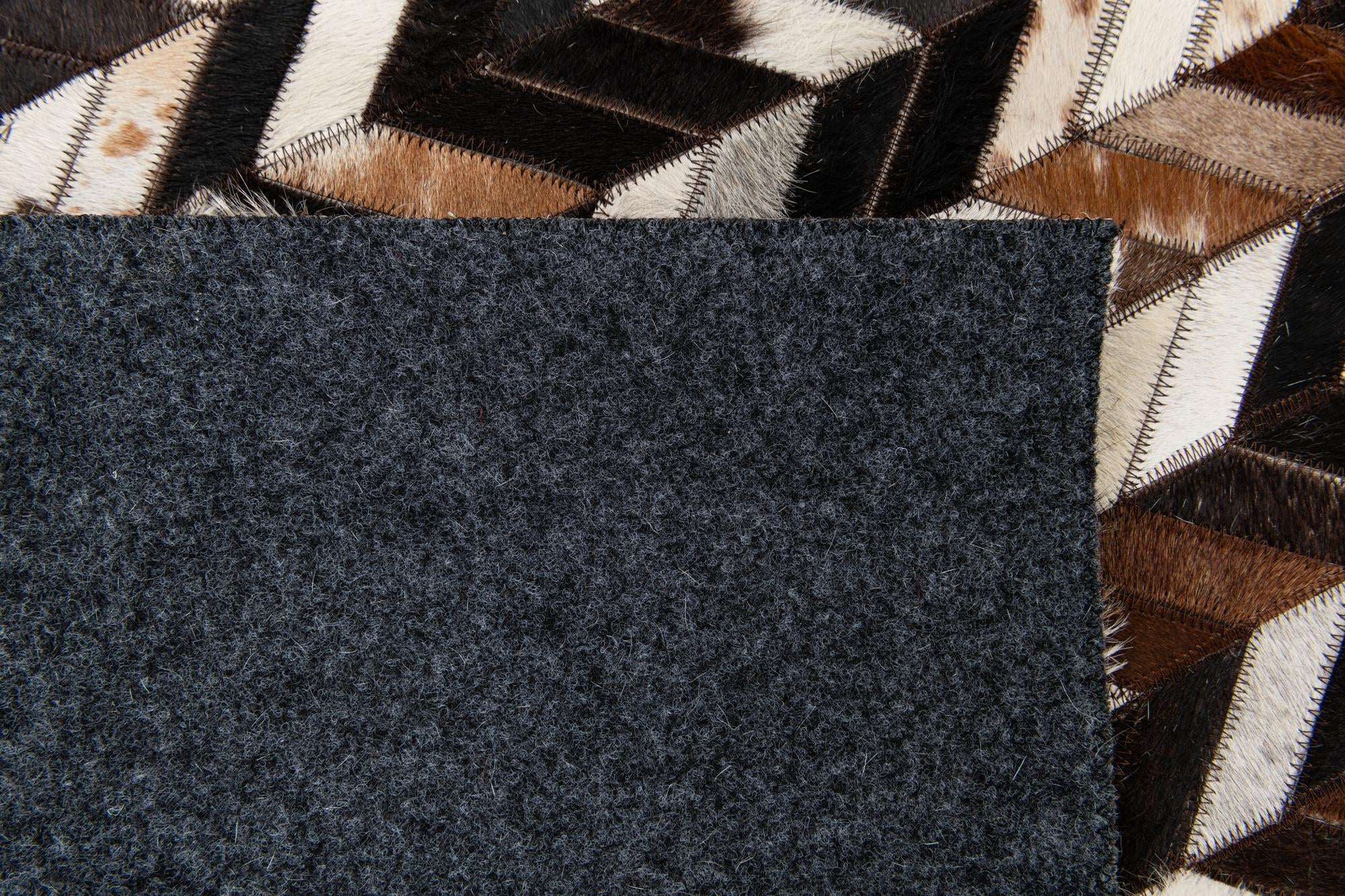 4' 11 x 8' Cowhide Stocks Rug