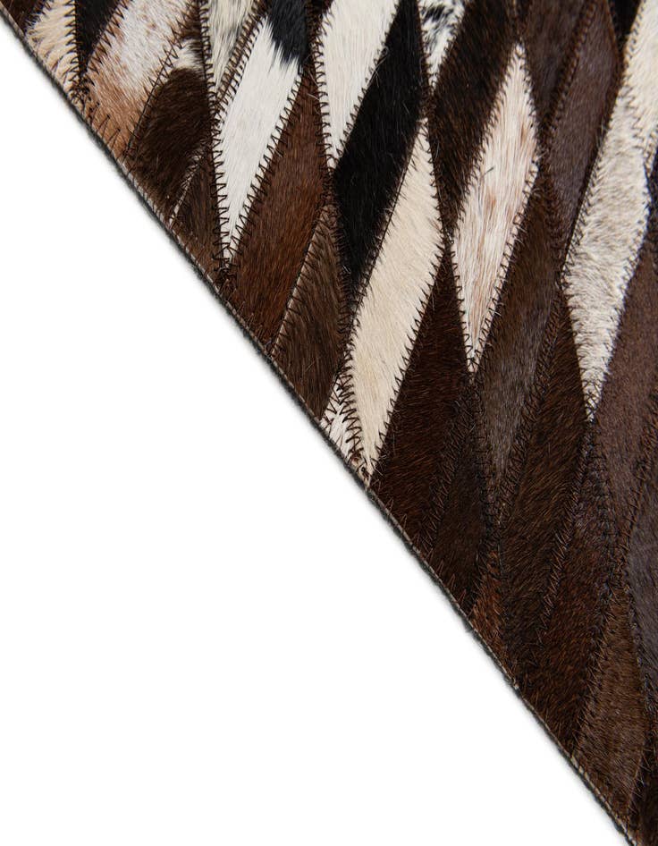 Detail image of 5' x 7' 11 Cowhide Stocks Rug