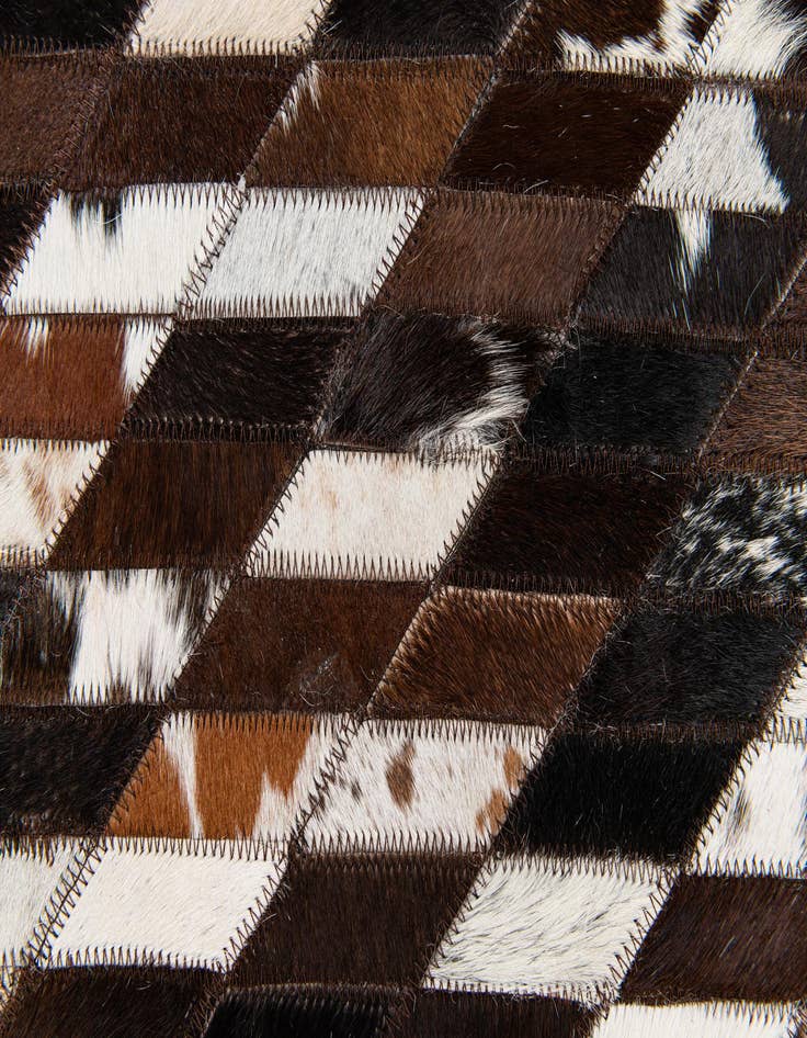 Detail image of 5' x 7' 11 Cowhide Stocks Rug