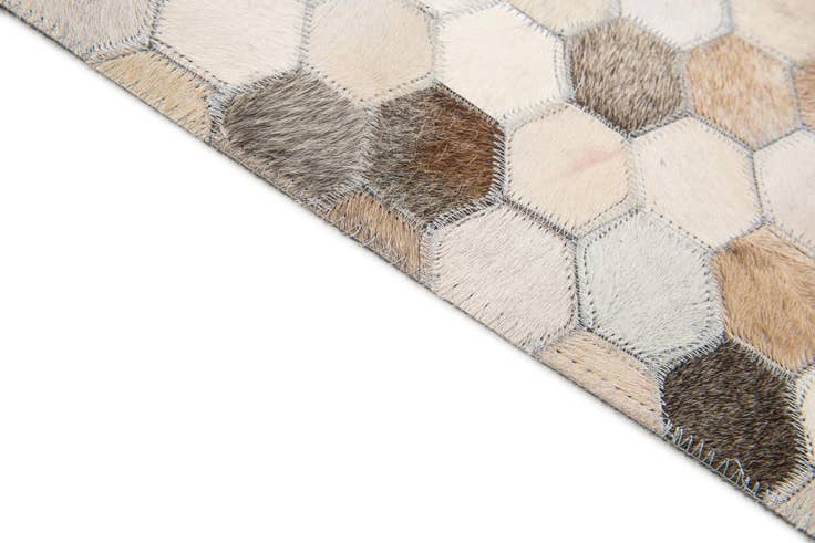 Detail image of 4' 11 x 7' 8 Cowhide Stocks Rug