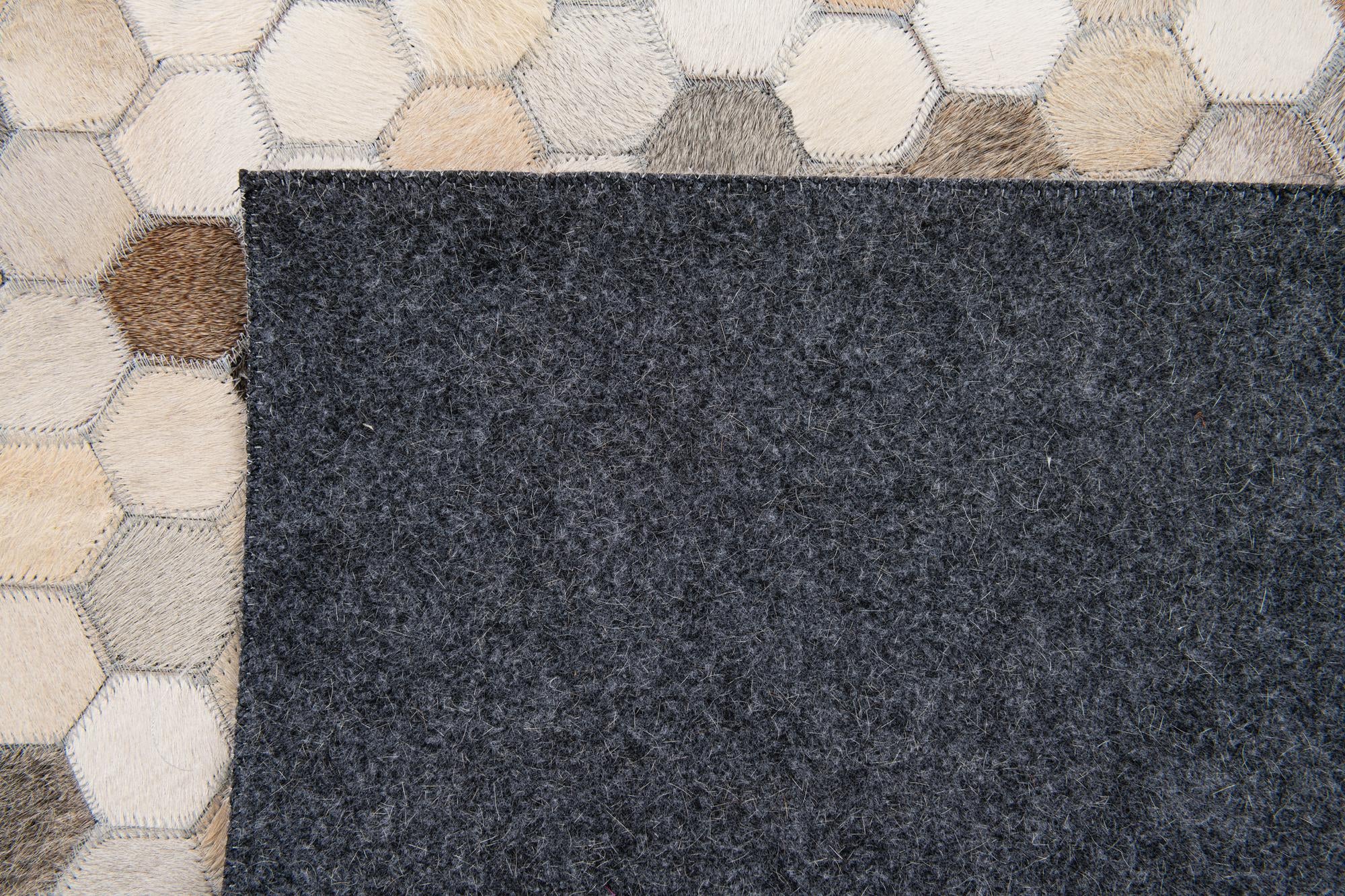 4' 11 x 7' 8 Cowhide Stocks Rug