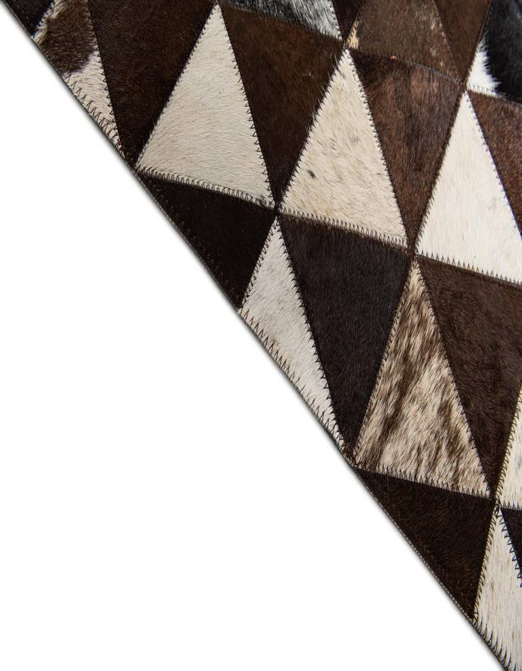 Detail image of 5' 1 x 8' 1 Cowhide Stocks Rug