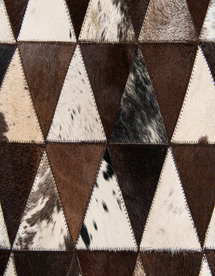 Detail image of 5' 1 x 8' 1 Cowhide Stocks Rug