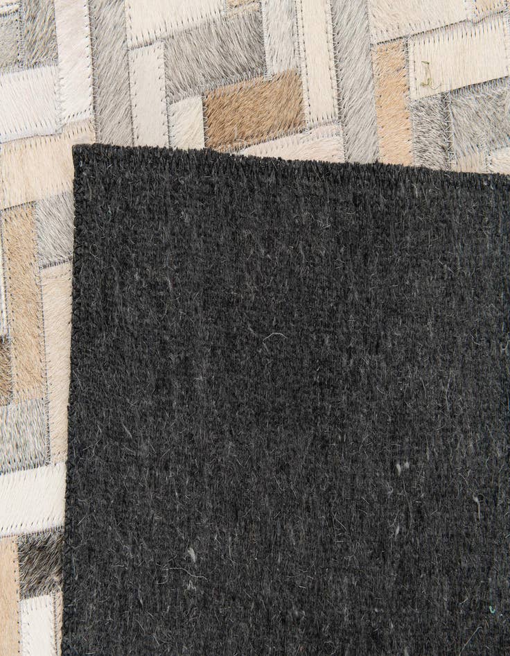 Detail image of 4' 10 x 7' 10 Cowhide Stocks Rug