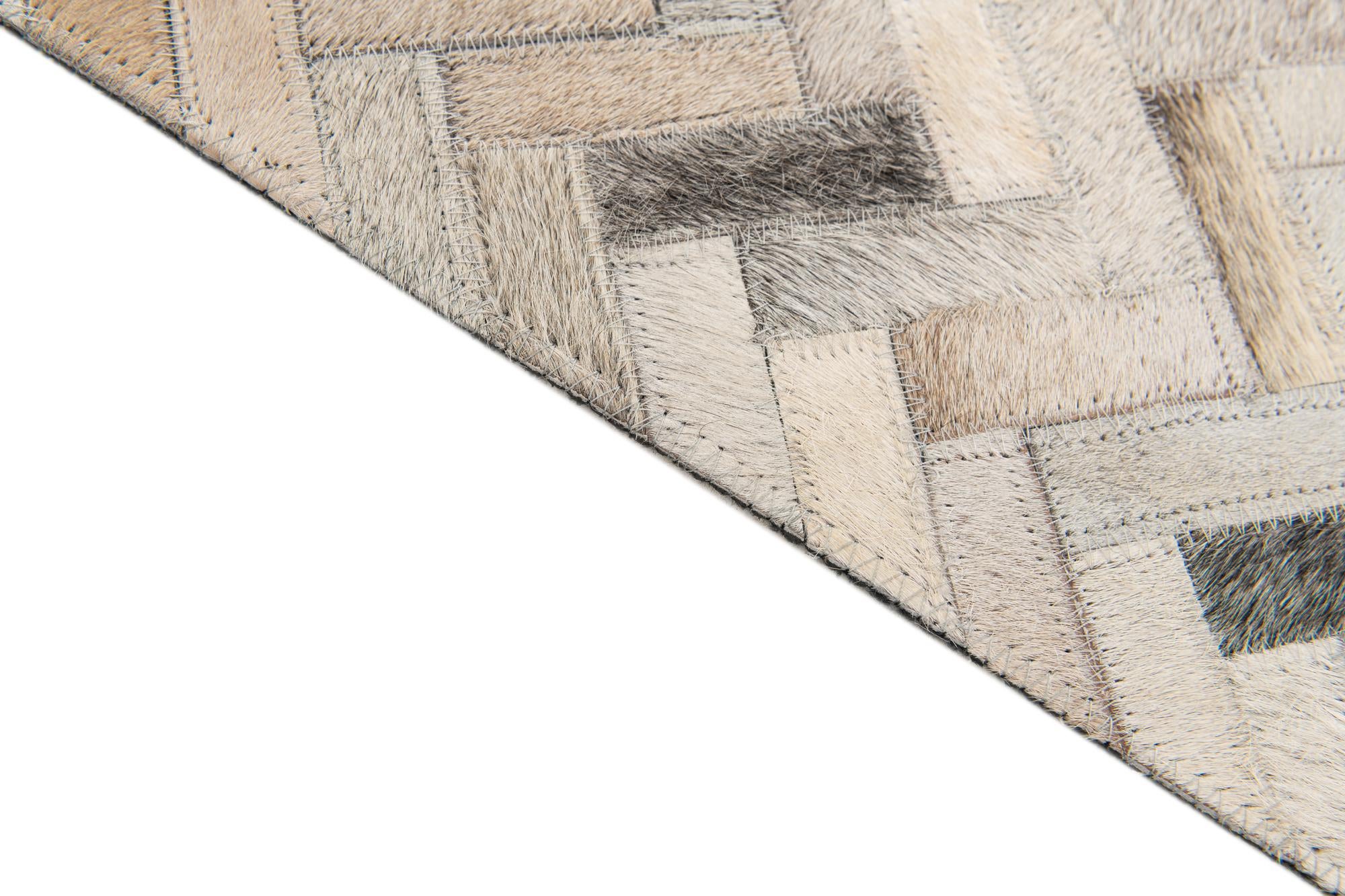 4' 10 x 7' 9 Cowhide Stocks Rug