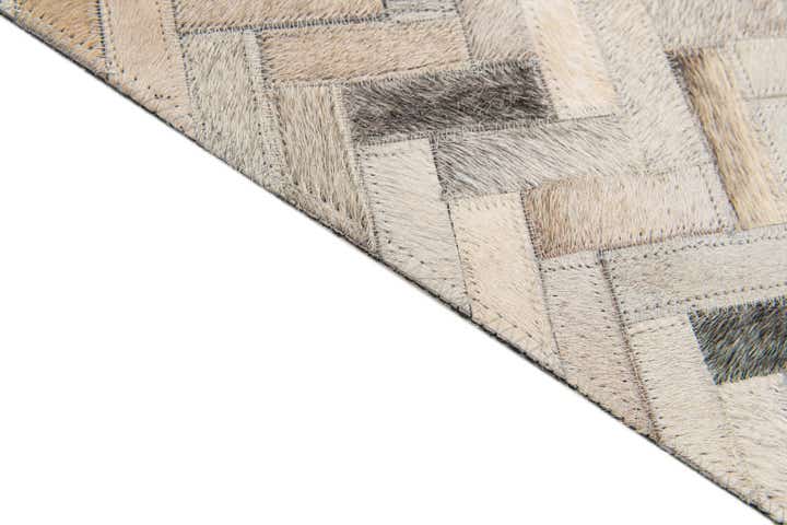 4' 10 x 7' 9 Cowhide Stocks Rug