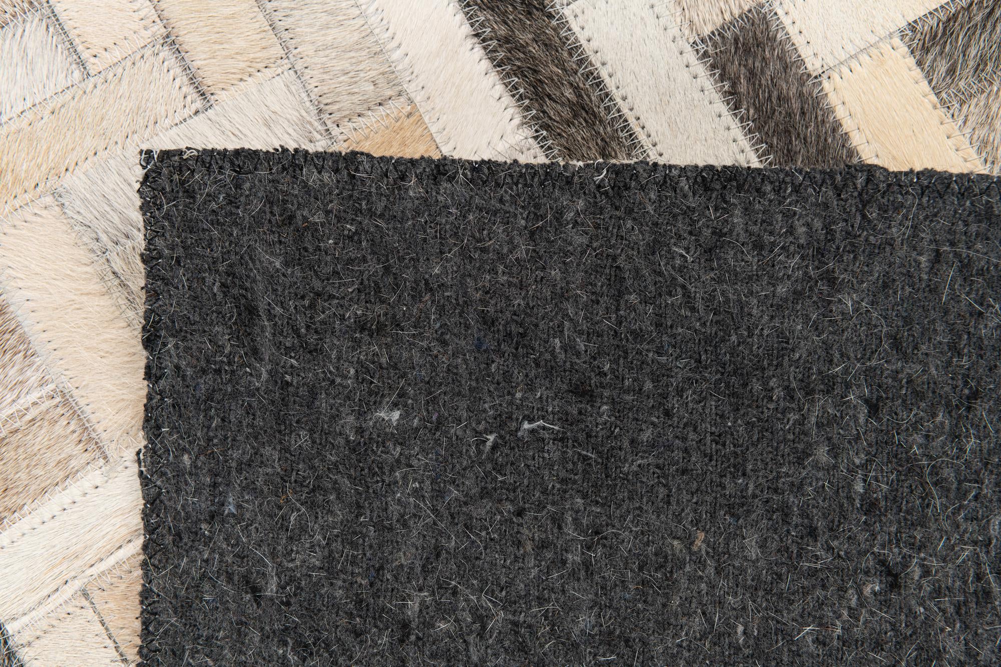 4' 10 x 7' 9 Cowhide Stocks Rug